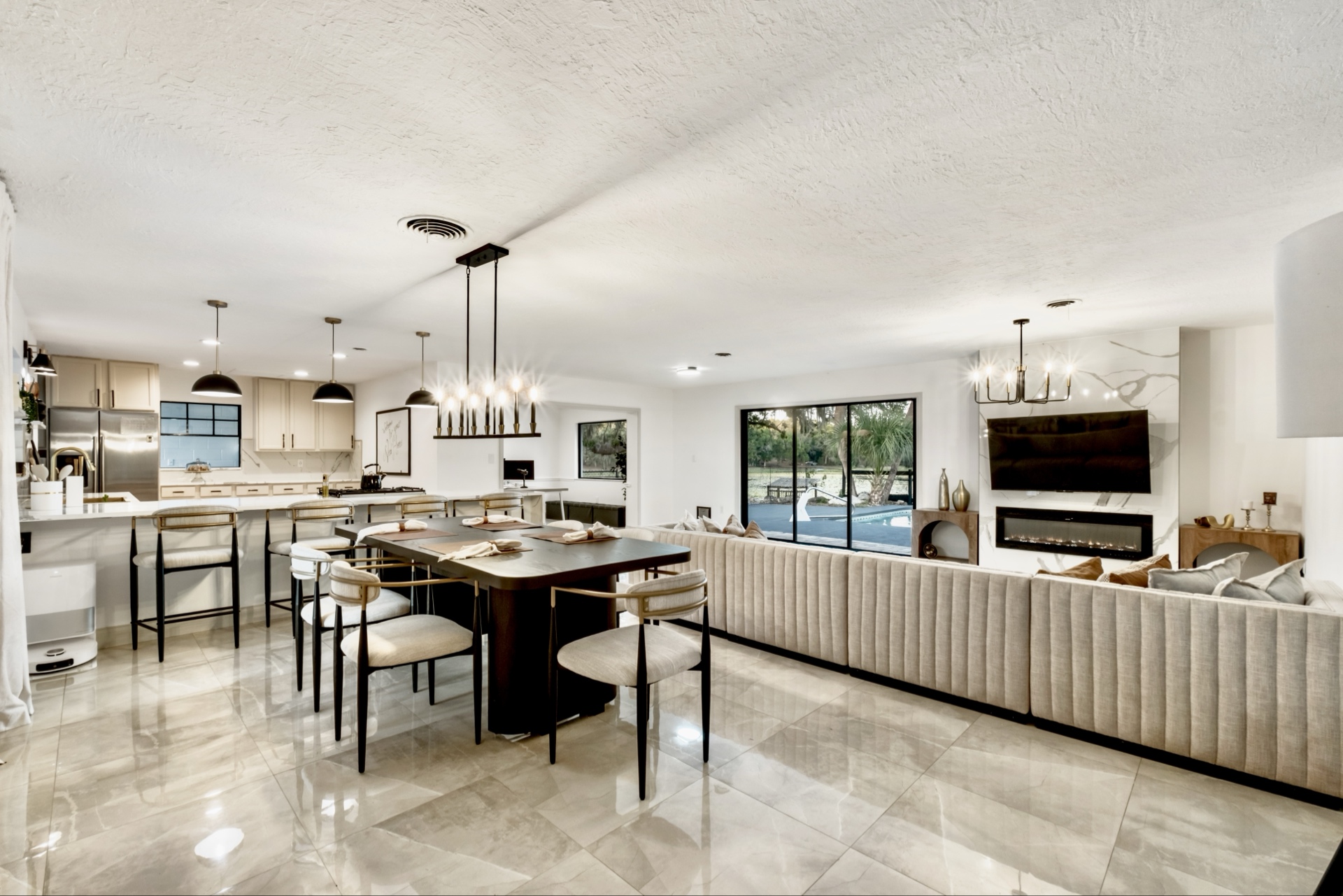 Open Floor Plan — Kitchen, Dining, Living & Pool View
