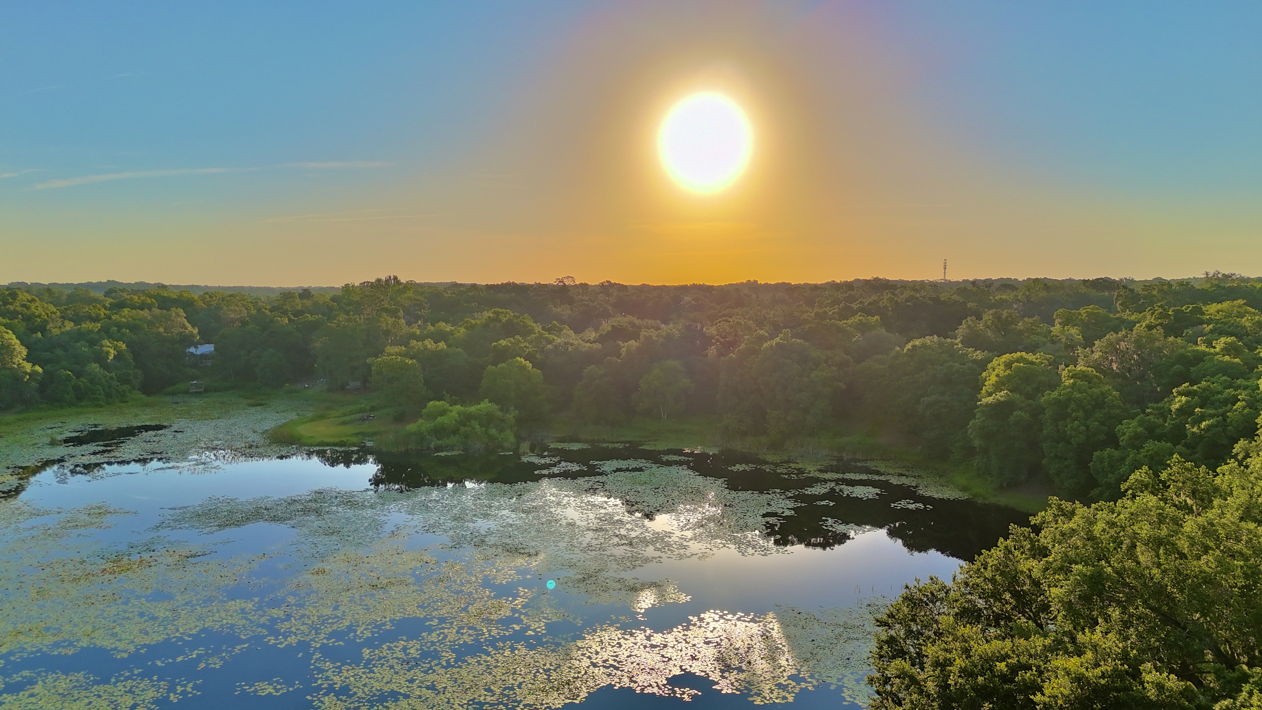 Sunset over the water — view from the property